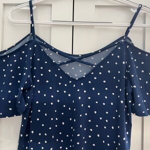 NWOT Cold shoulder blouse with shoulder straps perfect for a casual night out.
